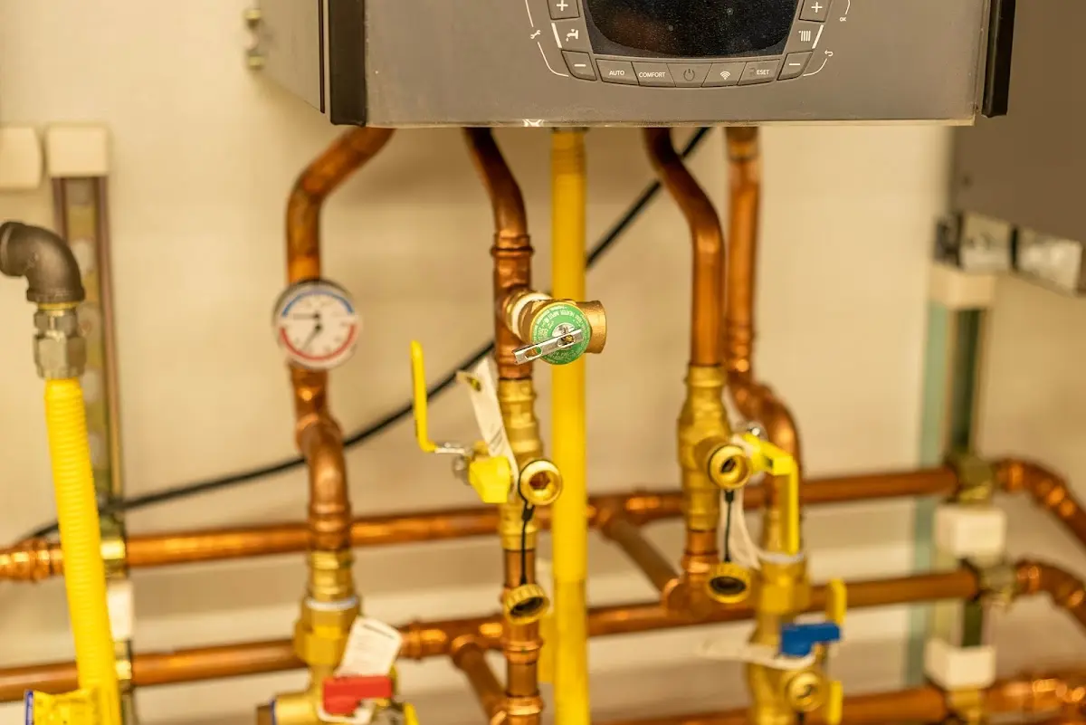 Licensed technician providing Water Heater Installation for a homeowner in West Liberty